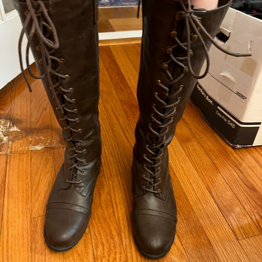 Breckelle’s knee high lace up boots